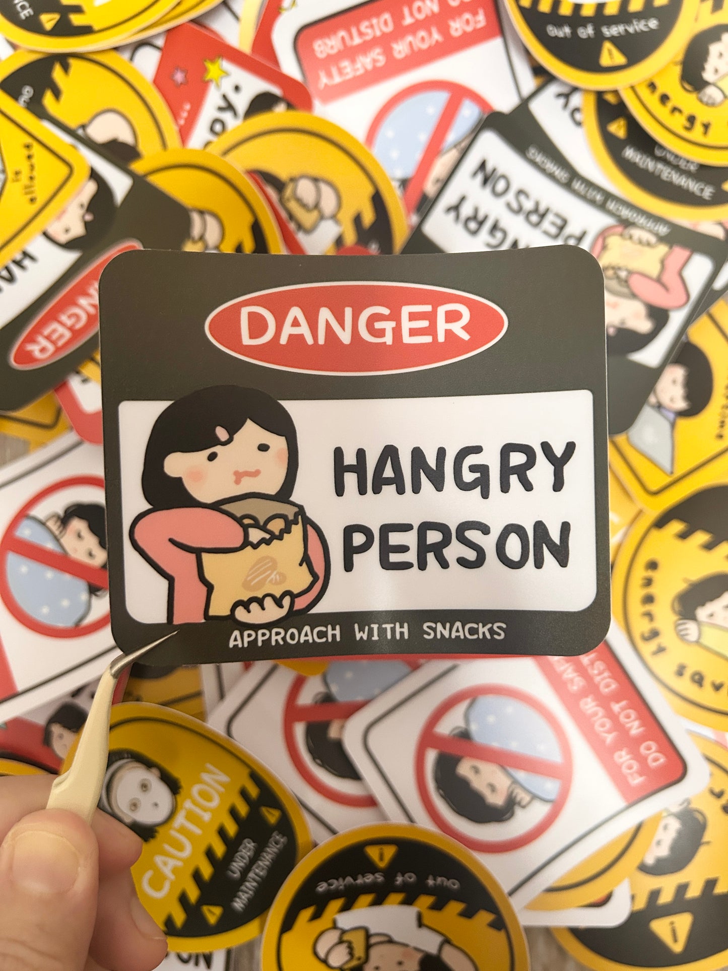 Humorous vinyl sticker warning signed-themed with text "Beware of Hangry Person".