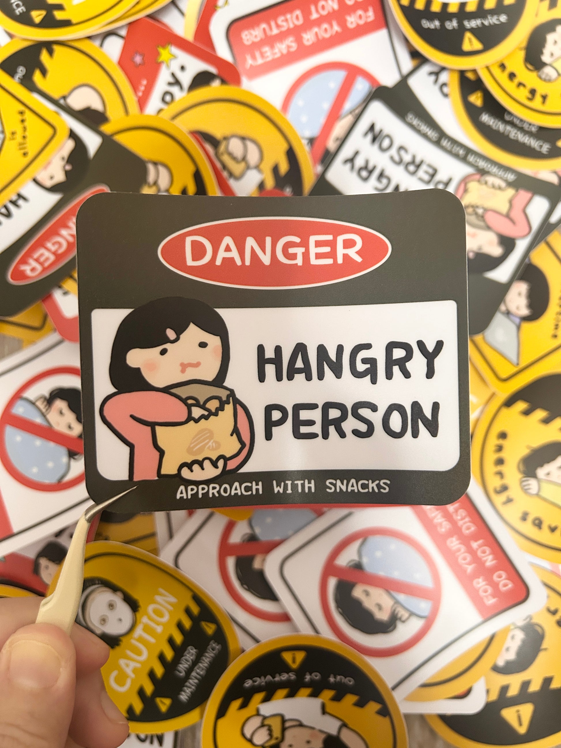 Humorous vinyl sticker warning signed-themed with text "Beware of Hangry Person".