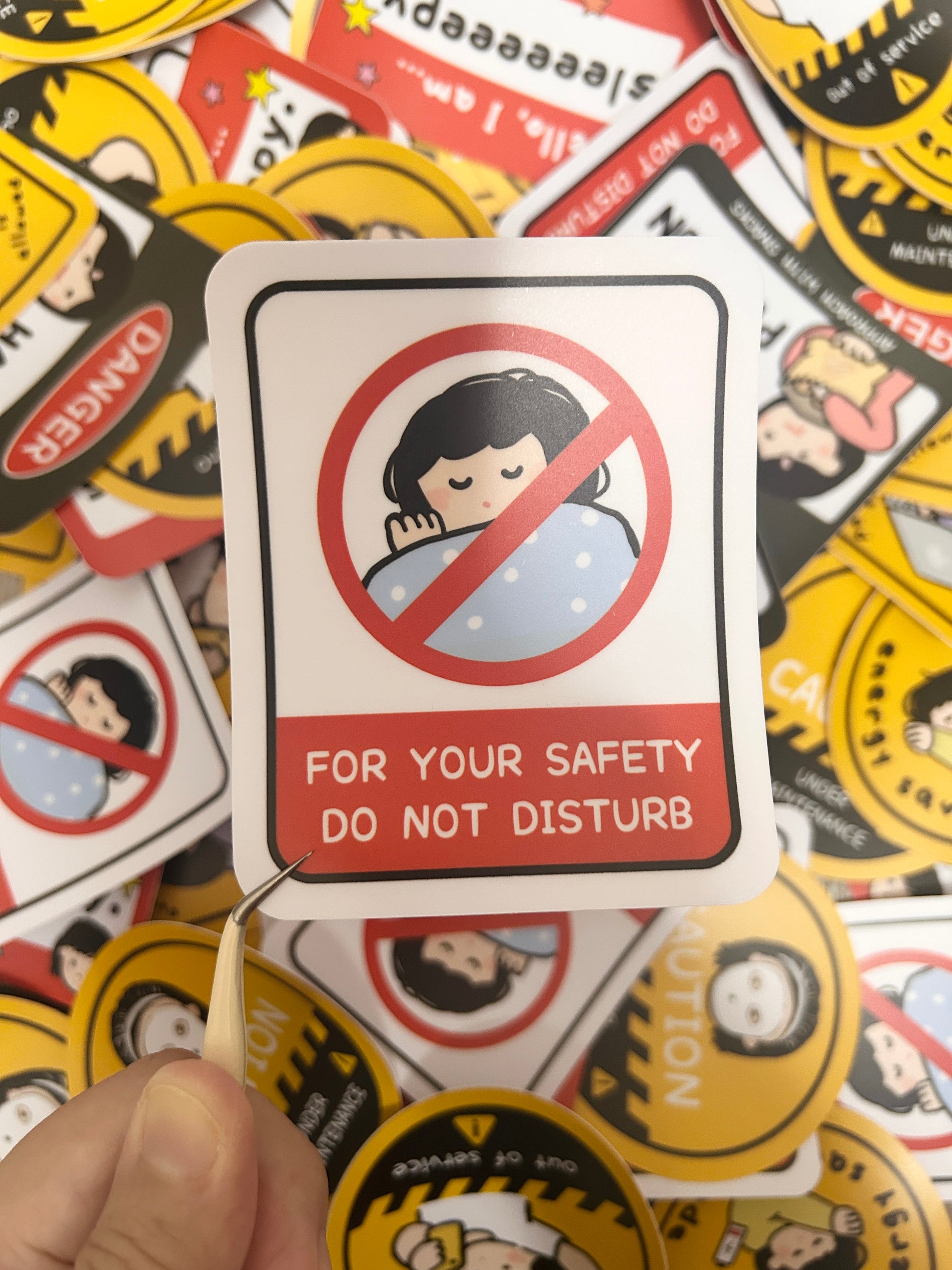 Humorous vinyl sticker warning signed-themed with text "For Your Safety Do Not Disturb".