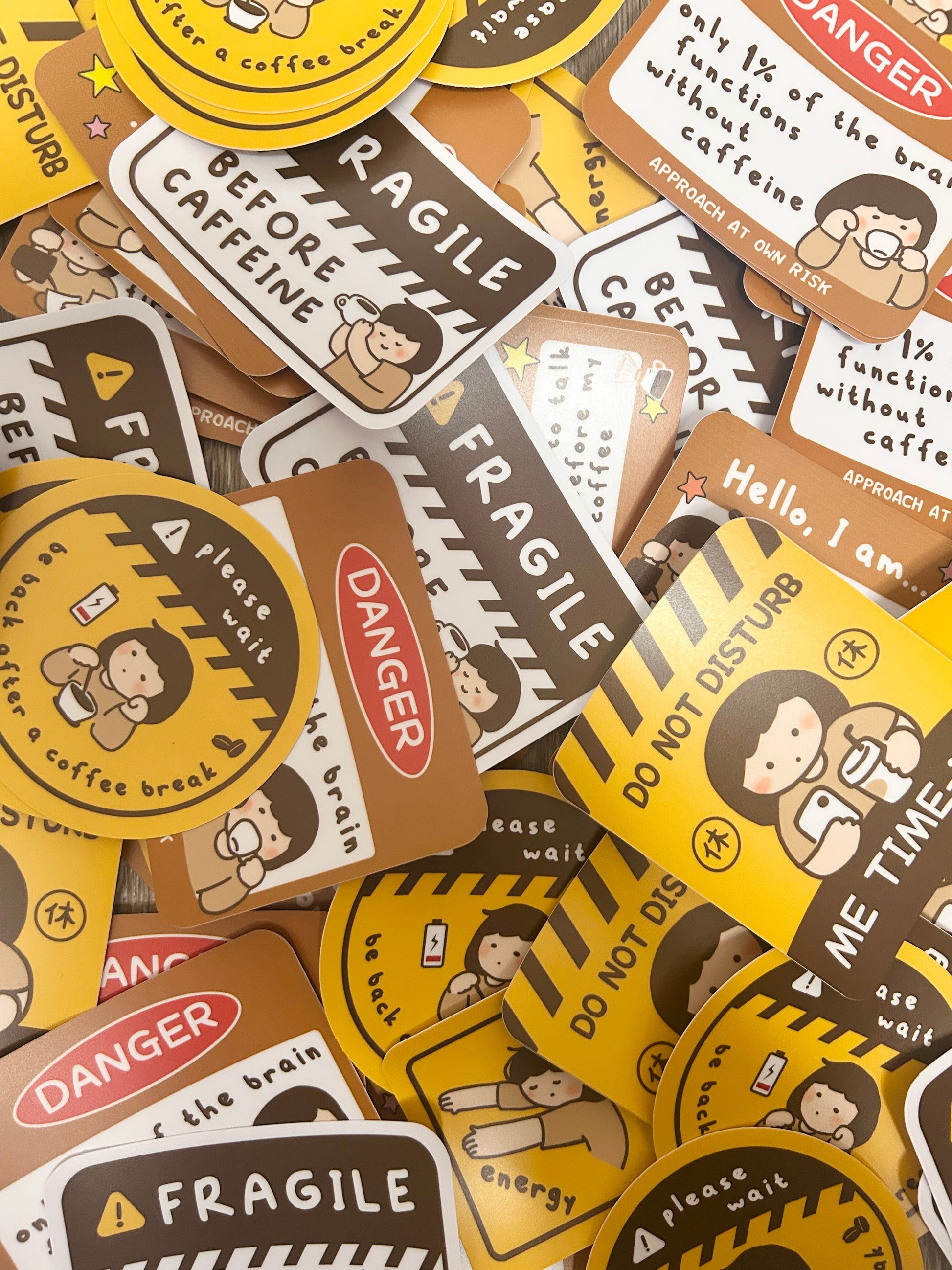 Collection of humorous and caution-themed stickers with text and graphics.