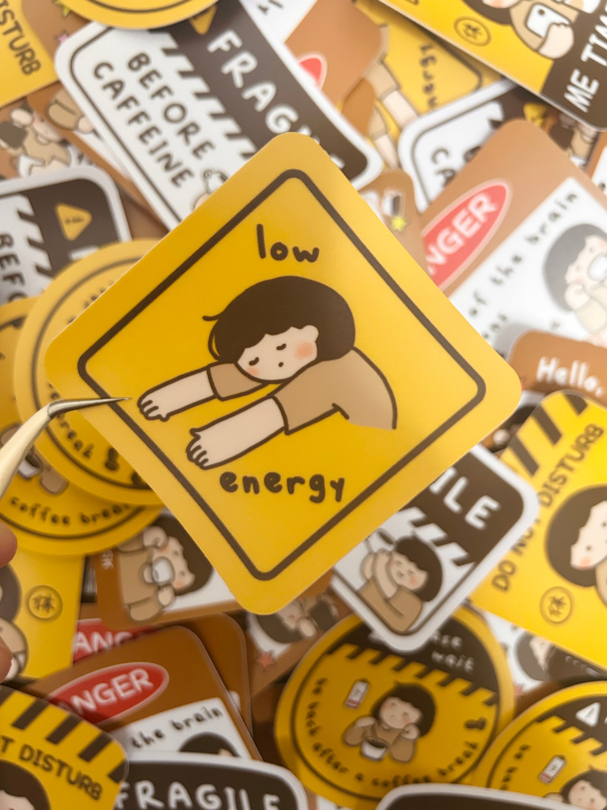 Vinyl sticker with humorous text "low energy" coffee-themed designs.
