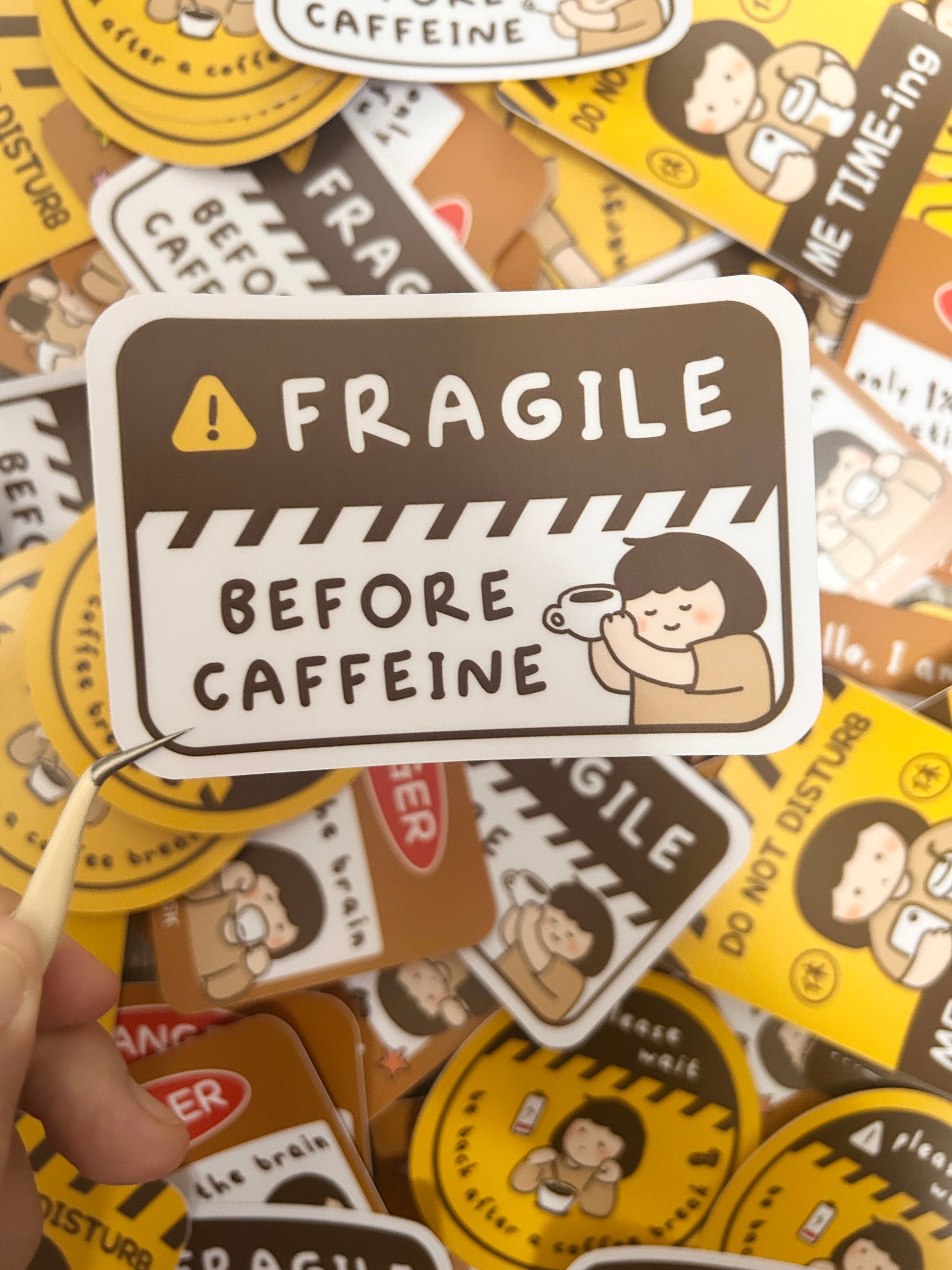 Vinyl sticker with humorous text "Fragile Before Caffeine" coffee-themed designs.