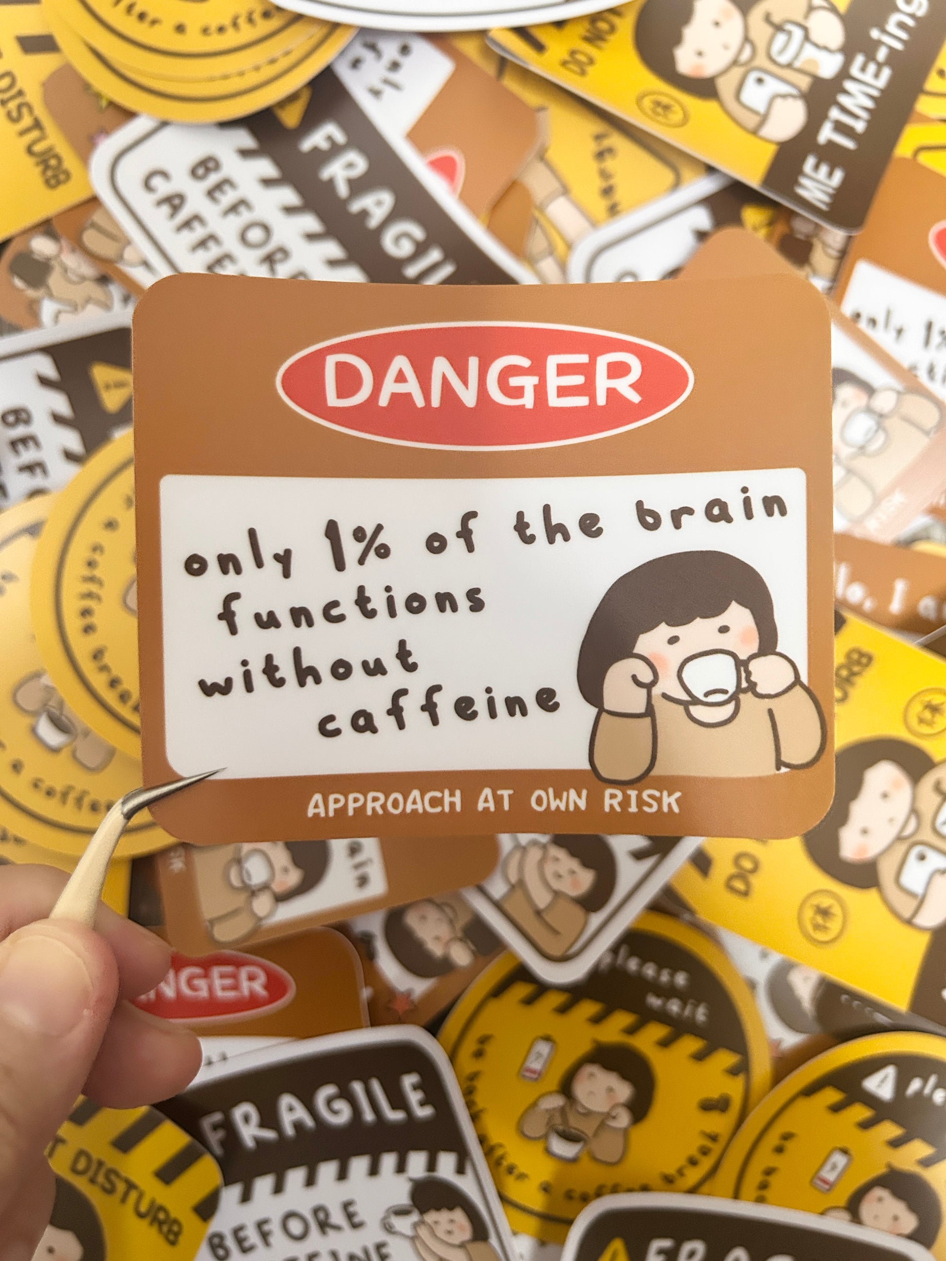 Vinyl sticker with humorous text "Danger Only 1% of the brain functions without caffeine" coffee-themed designs.