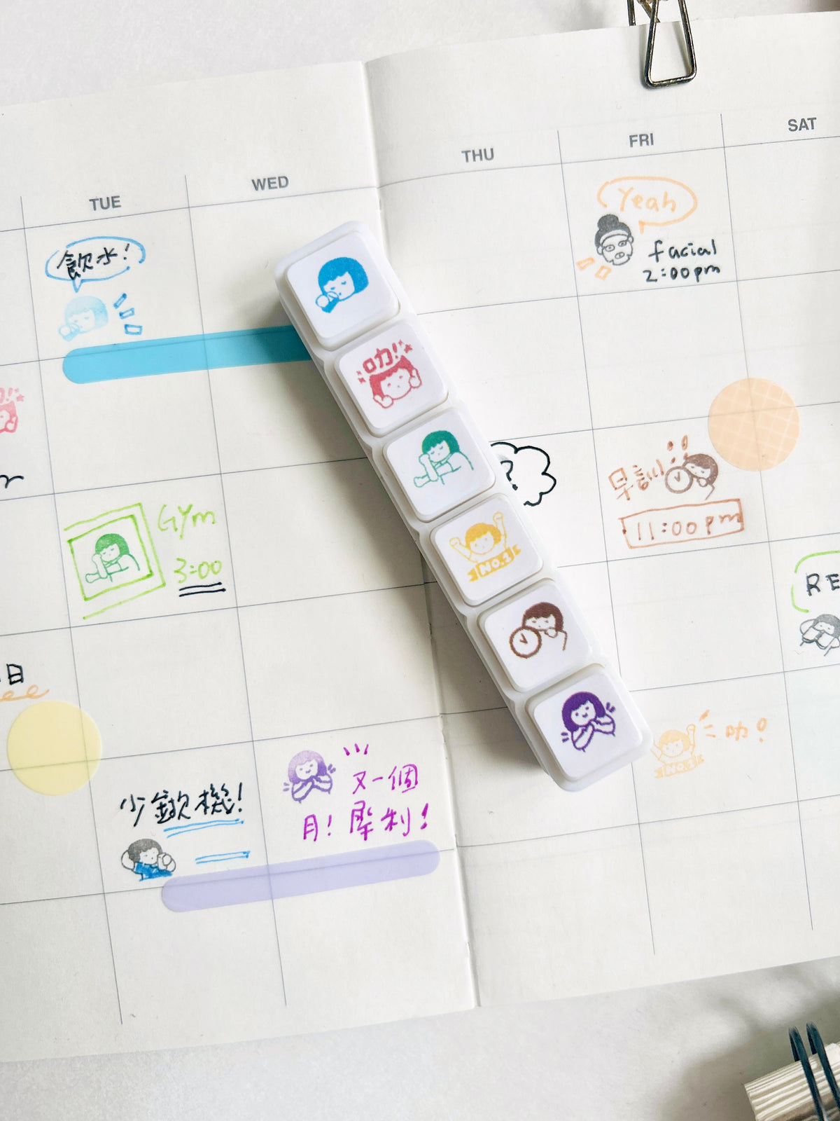 A 6 in 1 mini stamp, with 6 different illustrations include a girl drinking, a girl thumbs up, a girl stretching, a girl cheering with a banner with text yeah, a girl sleeps, and a girl clapping
